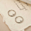 Heart in Circle Earrings Piercing